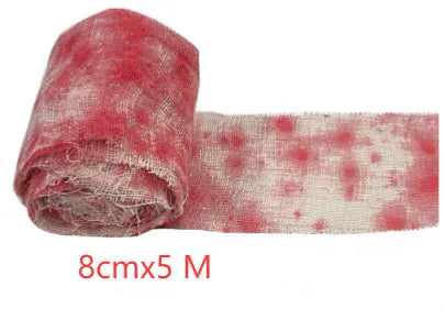 Halloween horror style bloody red dyed gauze bandage roll made from polyester fibre.
