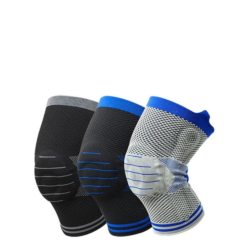 Cotton knee pad with silicone spring bar shock absorber in a two-tone colour scheme, shown in M, L, or XL size.