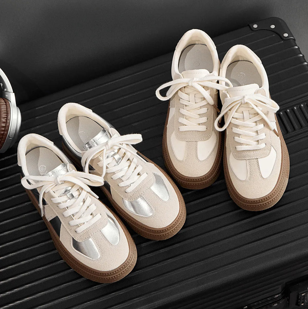 Women's retro casual board shoes with round toe, cross strap, and lace-up front in matte finish.