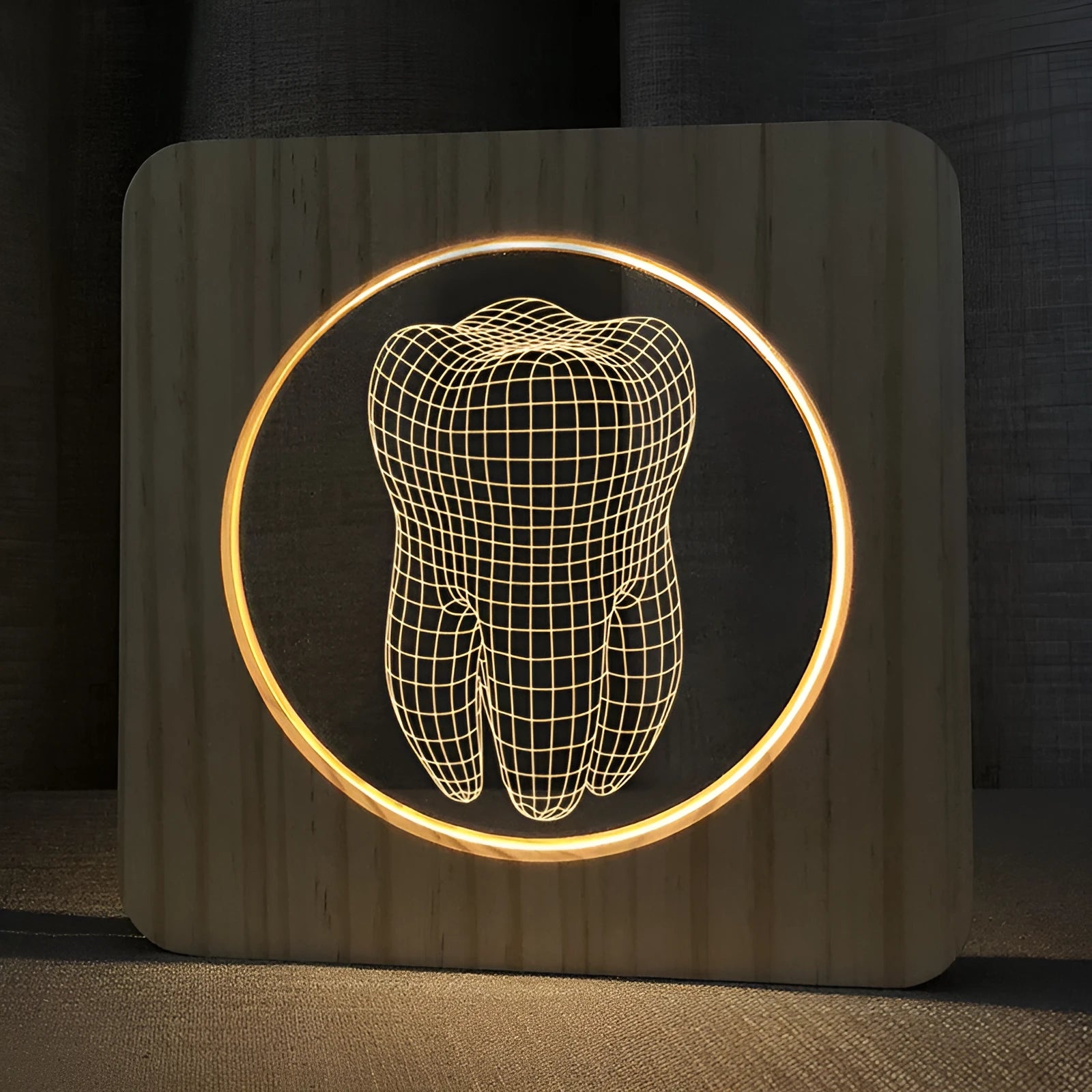 Tooth-shaped wood colour acrylic USB night light on a surface, showing its compact size.