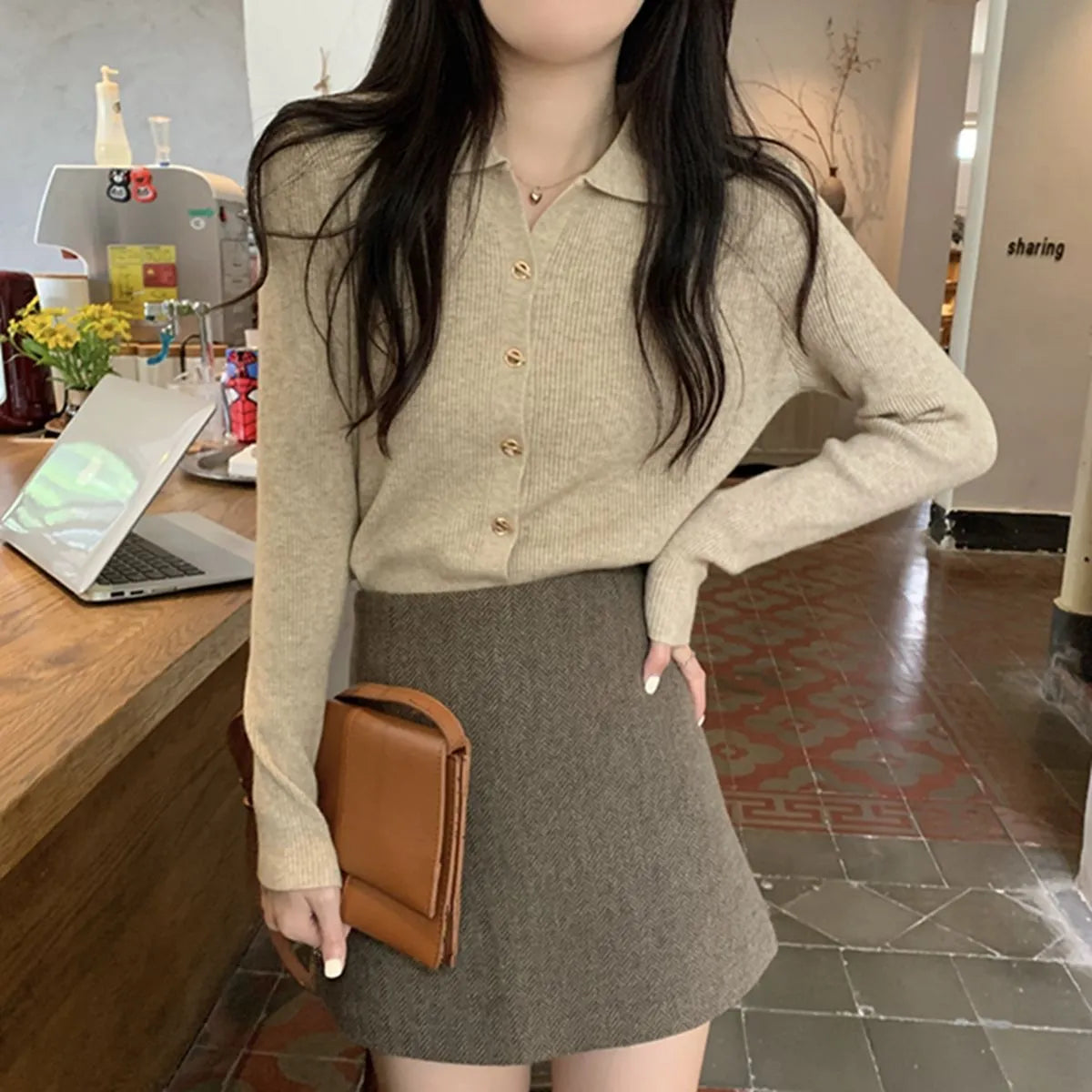 Long sleeved loose fit knitted cardigan top in viscose fibre, shown in beige colour.