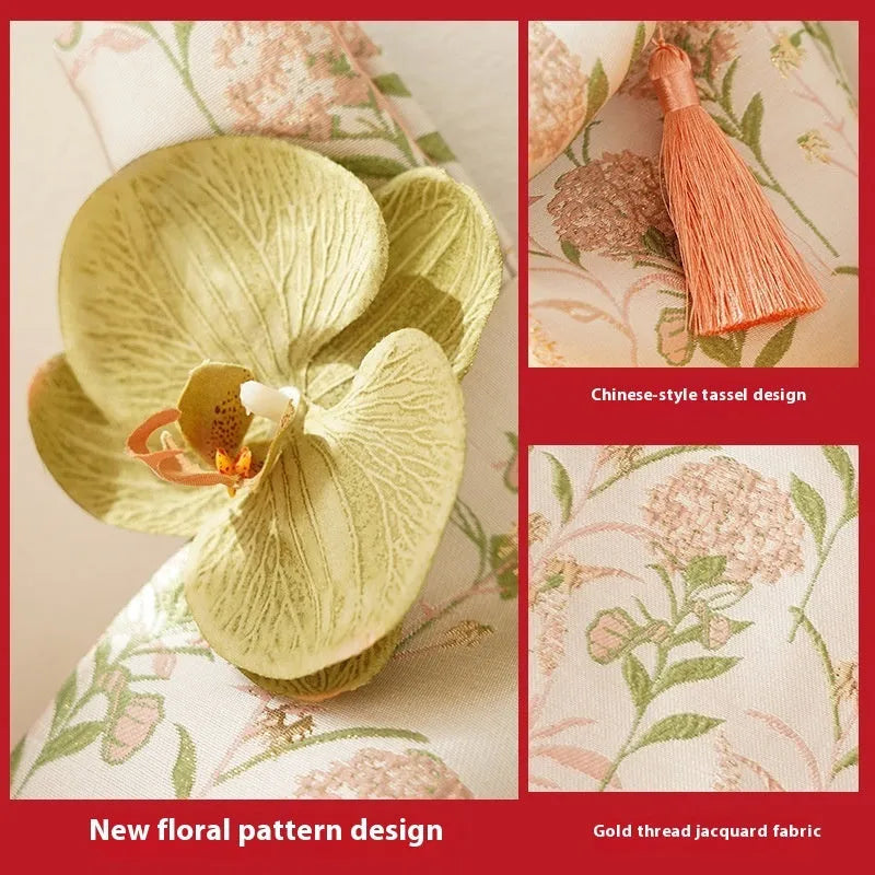 Chinese style gold silk jacquard hand-held cloth gift bag with flower accent in champagne colour on white background