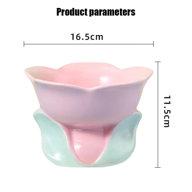Blue floral patterned raised ceramic pet bowl for cats and dogs on a non-slip base.