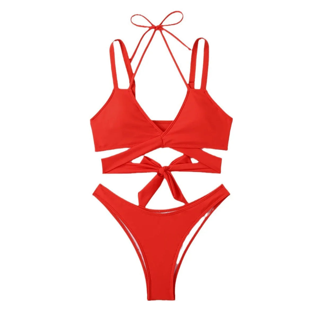 Women's solid colour strap beach bikini swimsuit in a briefs style, shown in one of five colour options.