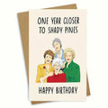 Simple printed paper birthday greeting card with a selection of coloured and kraft paper envelopes.
