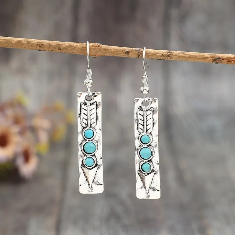 Women's geometric alloy earrings with turquoise inlay and silver electroplated finish