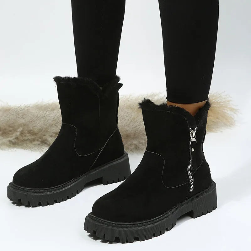 Women's black thick plush snow boot with side zip and faux fur lining