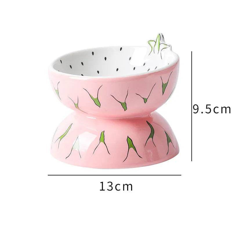 Orange ceramic raised cat bowl with tilted design and non-slip base.