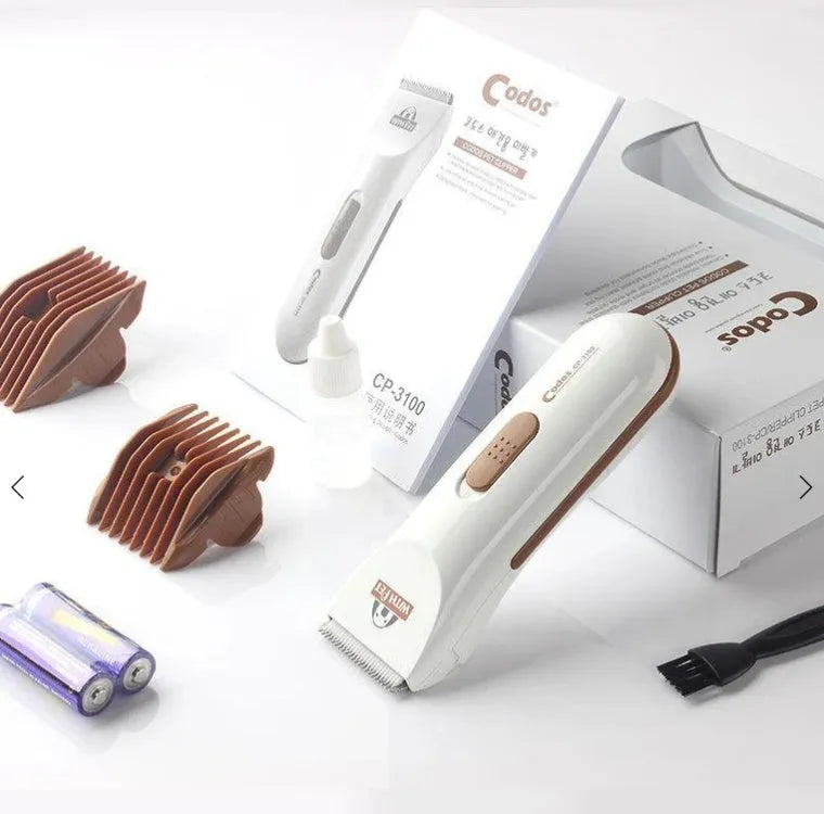 White electric pet hair clipper with ceramic blade for dog and cat grooming using AA batteries