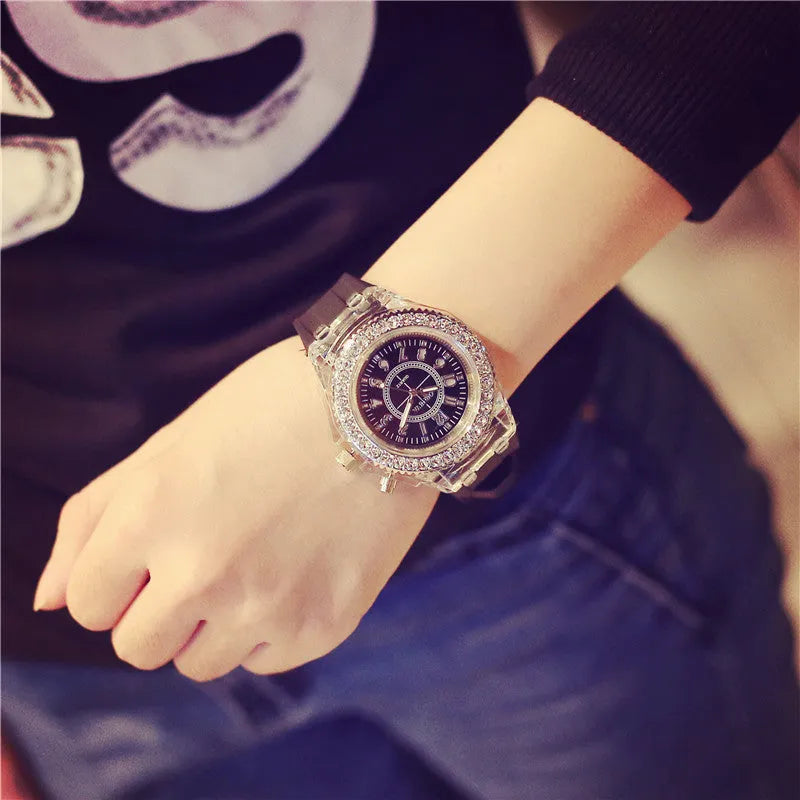 Women's LED luminous quartz watch with round 43mm alloy case and colourful silicone strap options.
