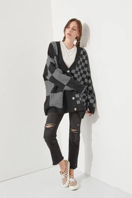 Grey printed checks knitwear cardigan on a model, showing loose slim fit and regular sleeves.