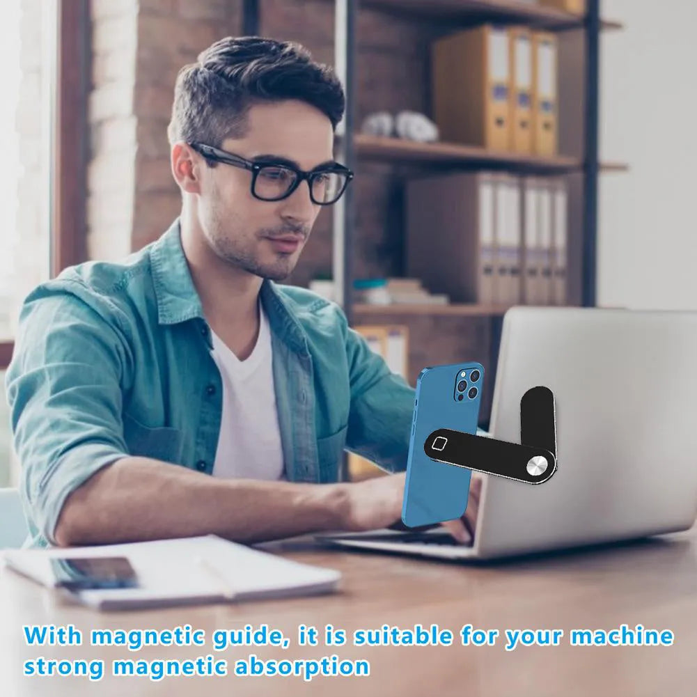 Black aluminum laptop phone holder with magnetic mount attached to computer monitor