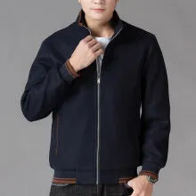 Men's grey zip-up fleece jacket with a stick pocket, shown in a sports style.