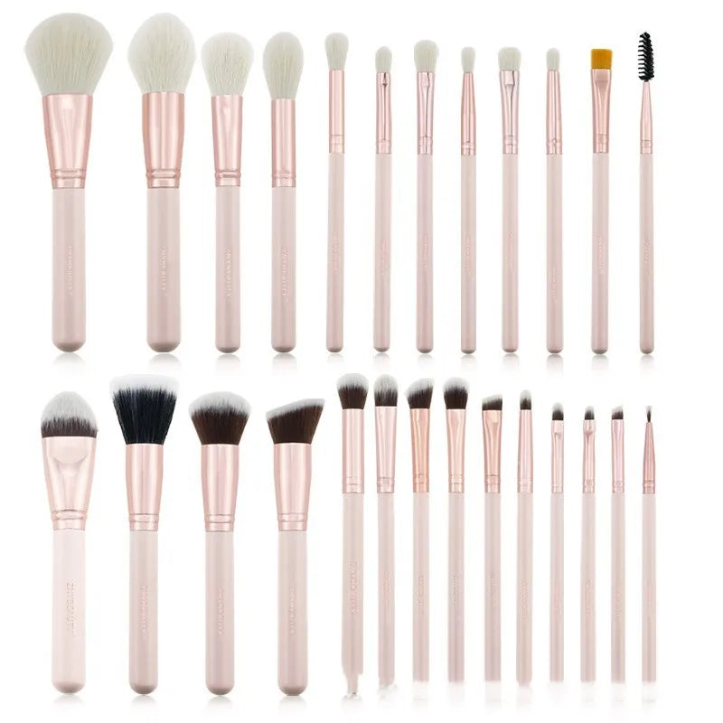 26 pink-handled makeup brushes with wool bristles in a rolled-up PU case
