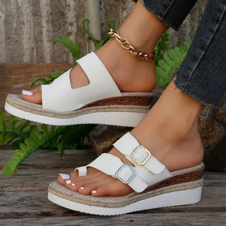 White patent leather woven wedge sandals with peep toe and round toe design