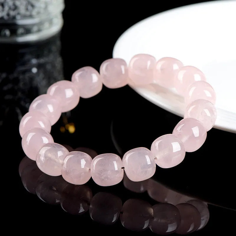 Pink bamboo crystal barrel bead bracelet with 11-12mm geometric design