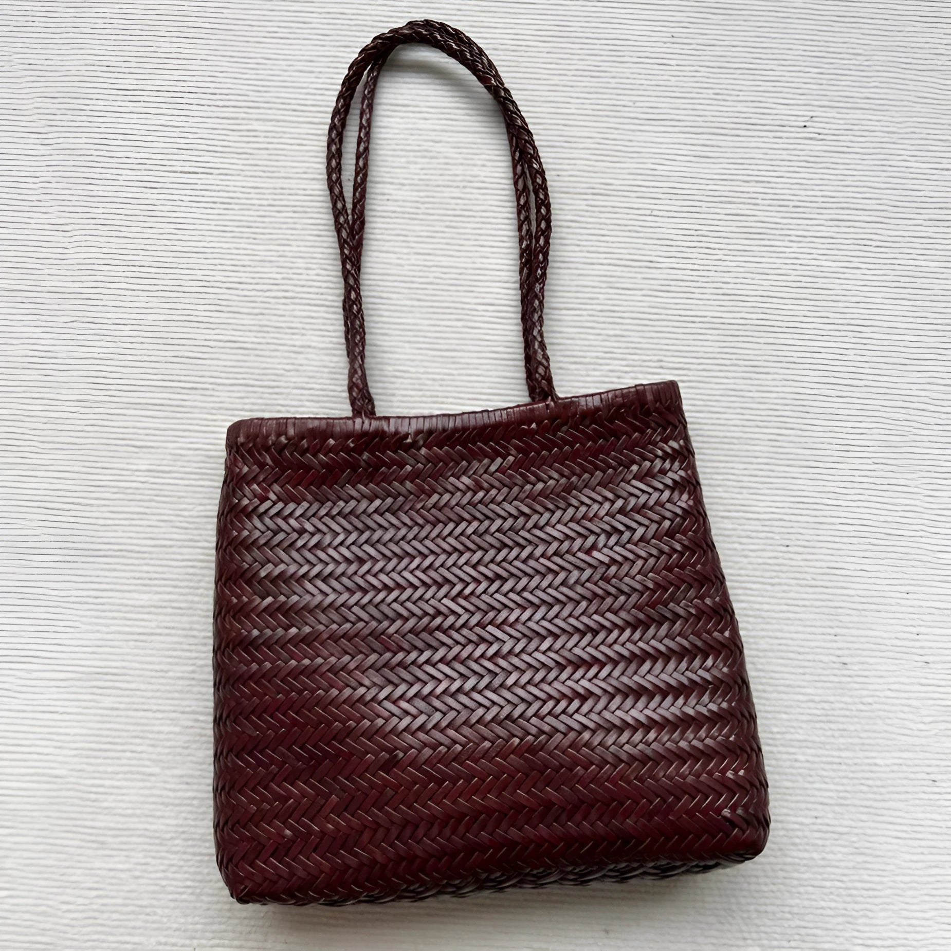 Brown woven genuine cowhide leather tote bag with three-dimensional pockets