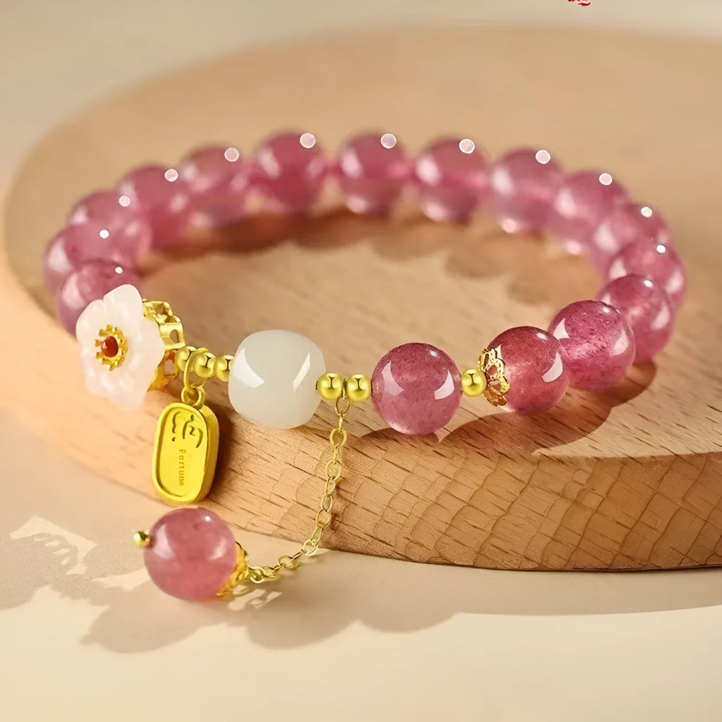 Handmade strawberry quartz crystal bracelet with Hetian jade peach blossom design showing five style variations
