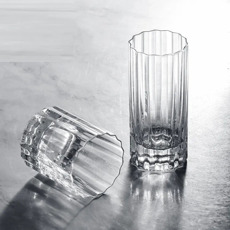 Light luxury crystal glass thick bottom lace whiskey glass with clear transparency, single tumbler style.