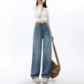 Women's high waist wide leg jeans in retro blue denim with straight cut