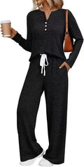 A person wearing a striped V-neck knit long coat with lace-up details and pockets, paired with matching pants.