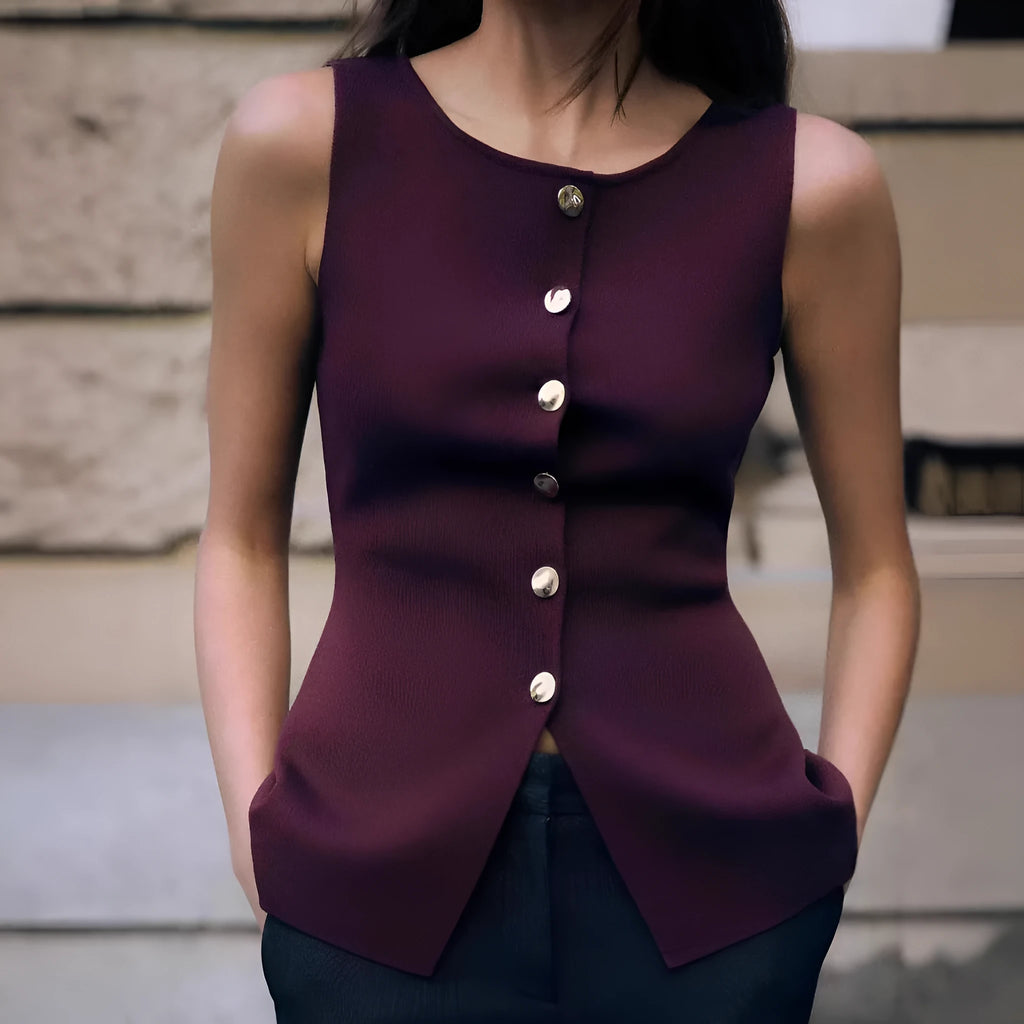 Women's dark red slim fit viscose vest with gold buttons and a textured 3D pattern, shown on a hanger.