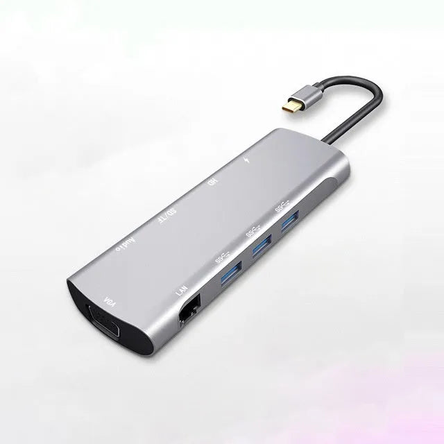Grey aluminium USB-C docking station with HDMI, VGA, USB 3.0 ports and a 140mm cable.