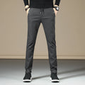 Men's casual cotton trousers in wild youth style, available in army green, black, brown, and grey colours