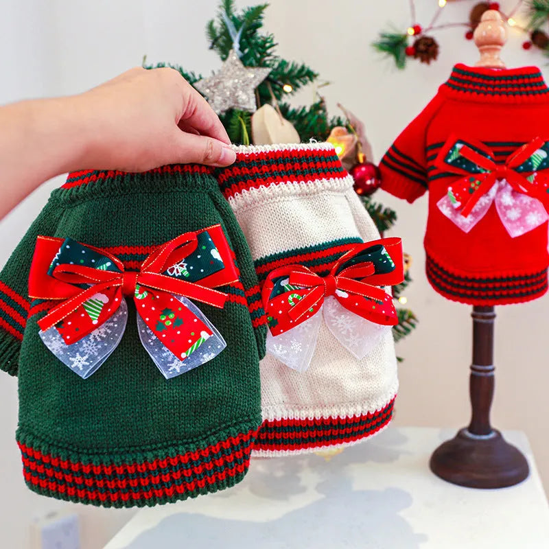 Green Christmas pet sweater for a small dog on a festive background.