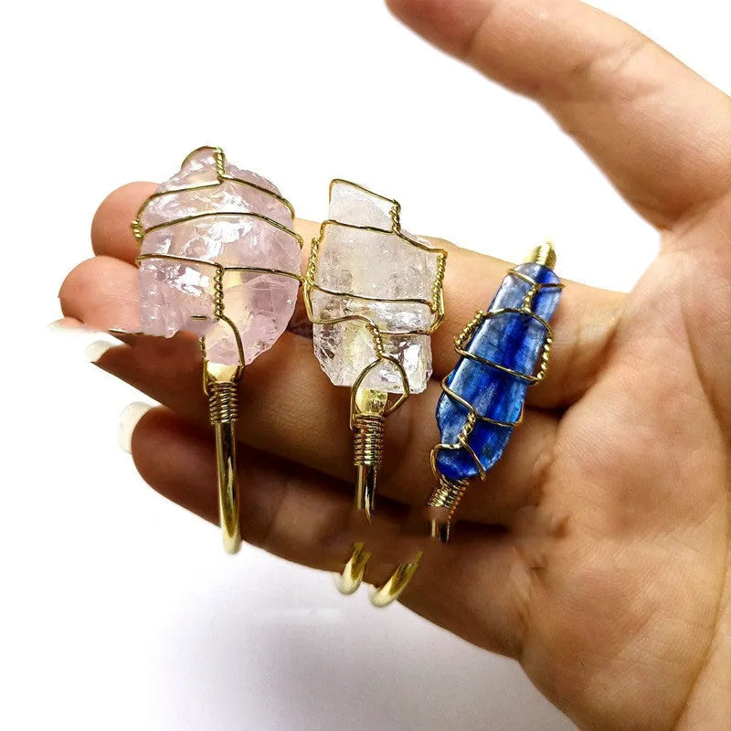 Natural rough crystal stone bracelet with geometric gold tone metal winding, bohemian style.