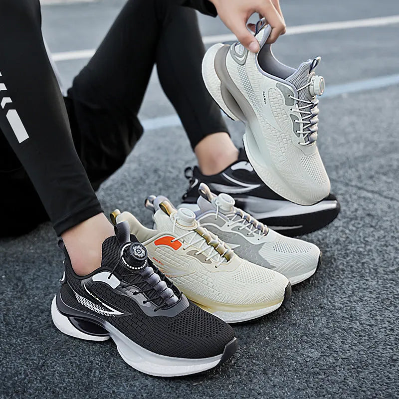 White rotating buckle low-top running shoes with breathable fly-knit mesh upper on a grey background.