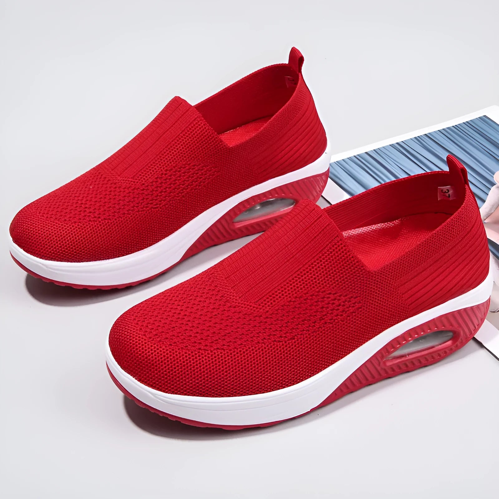 Women's mesh running shoes in beige with round toe and air cushion midsole.