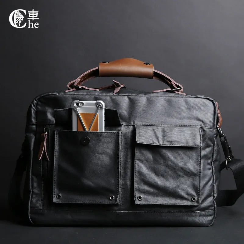 Dpark black laptop shoulder bag for 14 or 15 inch laptops like Lenovo and Apple MacBooks.