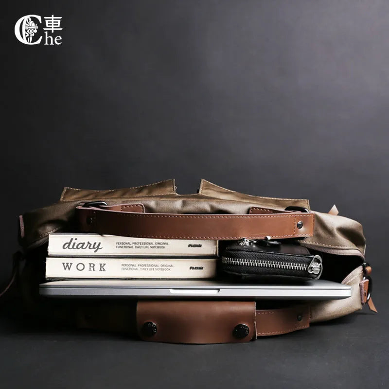 Dpark black laptop shoulder bag for 14 or 15 inch laptops like Lenovo and Apple MacBooks.