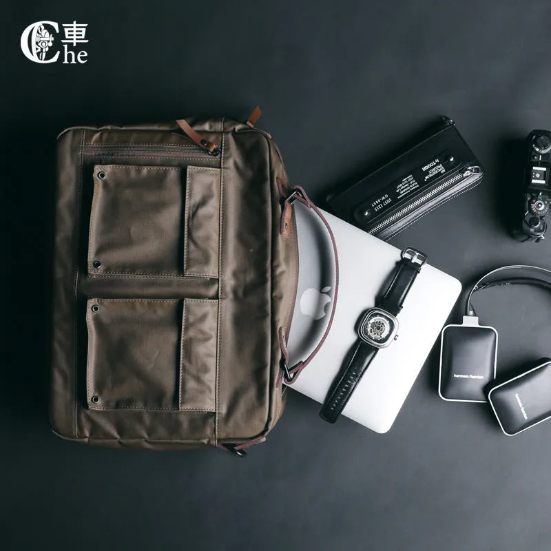 Dpark black laptop shoulder bag for 14 or 15 inch laptops like Lenovo and Apple MacBooks.