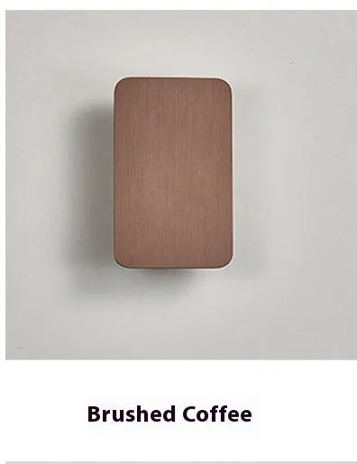 Minimalist Nordic-style LED wall lamp in black finish, mounted on a wall, showing clean lines and modern design.