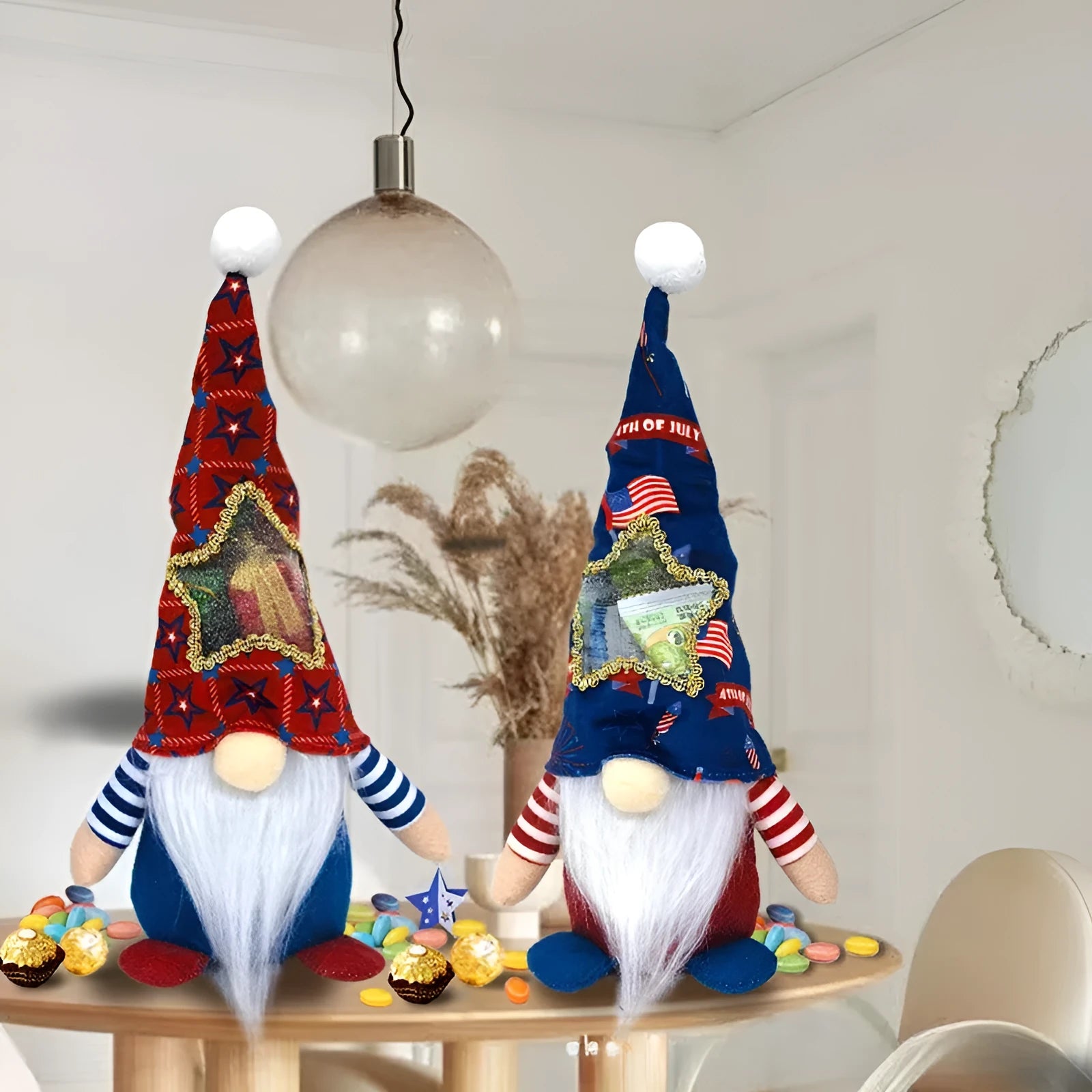Two soft cloth faceless baby doll Christmas ornaments with Rudolf reindeer design.