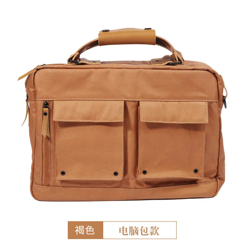 Dpark black laptop shoulder bag for 14 or 15 inch laptops like Lenovo and Apple MacBooks.