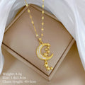 Moon tassel necklace with diamond elements on stainless steel chain and copper pendant