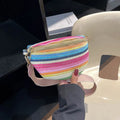 Women's woven straw beach bag with single shoulder strap in blue or pink