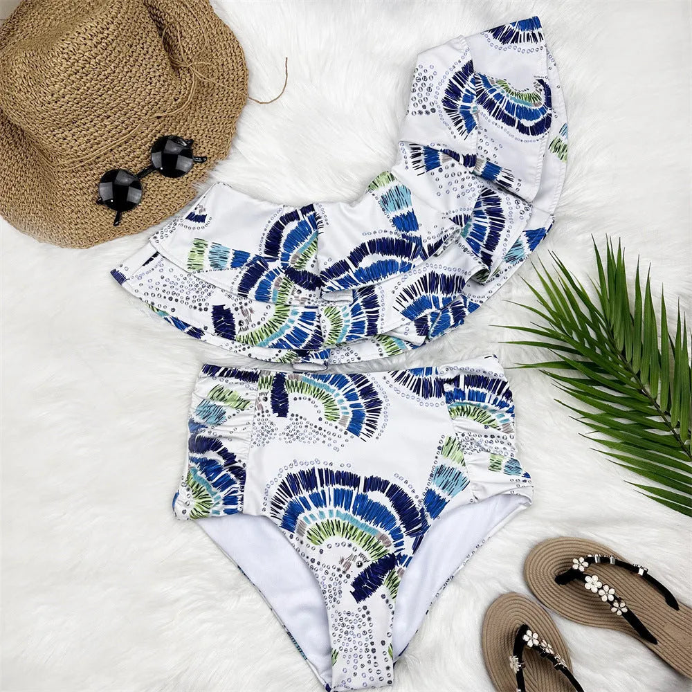 White women's one-shoulder swimsuit with double-layer construction and large lotus leaf detailing