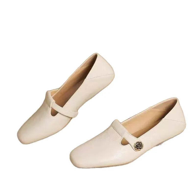 Retro square head genuine leather women shoes in beige with mid heel and square heel on a grey background