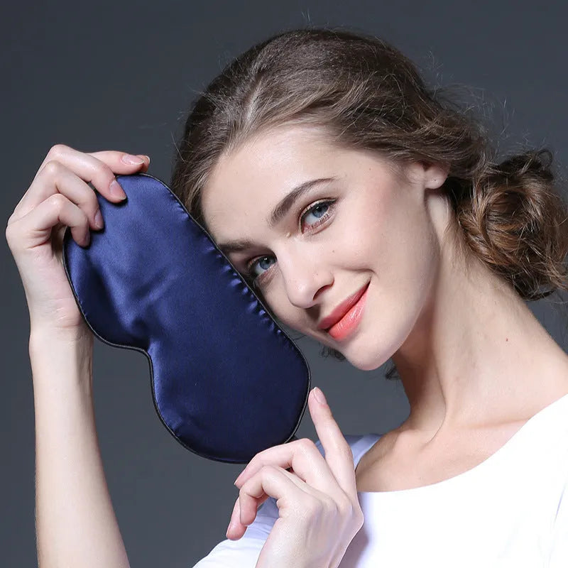 Double-sided mulberry silk eye mask in multiple colours, showing embroidery and print detail.
