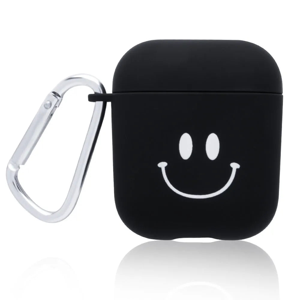 Black and pink Apple AirPods protective case with decorative back cover showing flower and smiley face designs