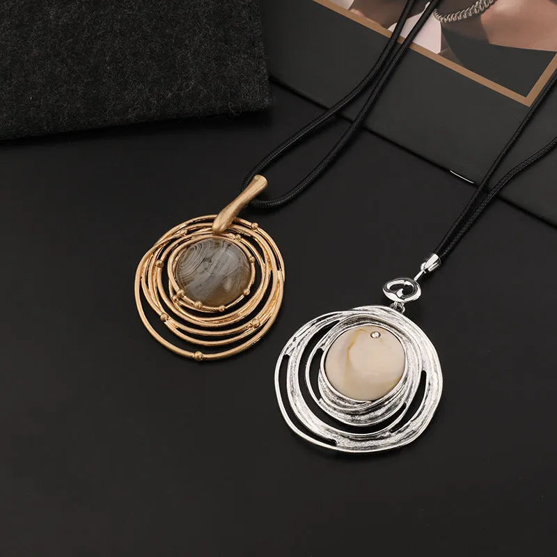Gold geometric plaid pattern necklace on snakeskin wax rope chain with adjustable length