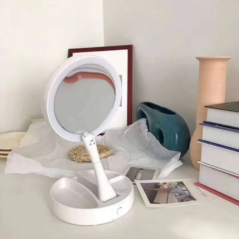 White acrylic frame vanity mirror with LED lights, USB charging port, and foldable design showing storage compartments