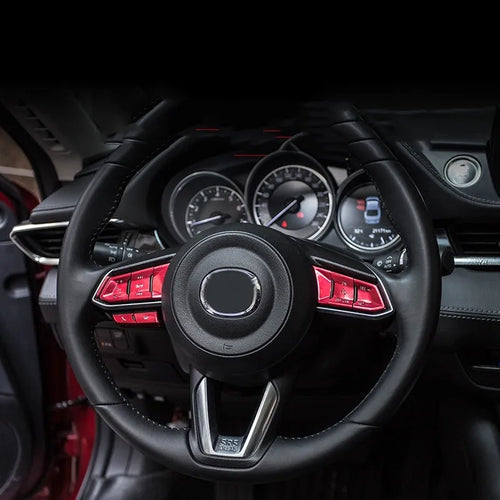Atz modified vehicle steering wheel decorative sticker set showing aluminum alloy hollow button styles in brushed red, silver, and blue finishes