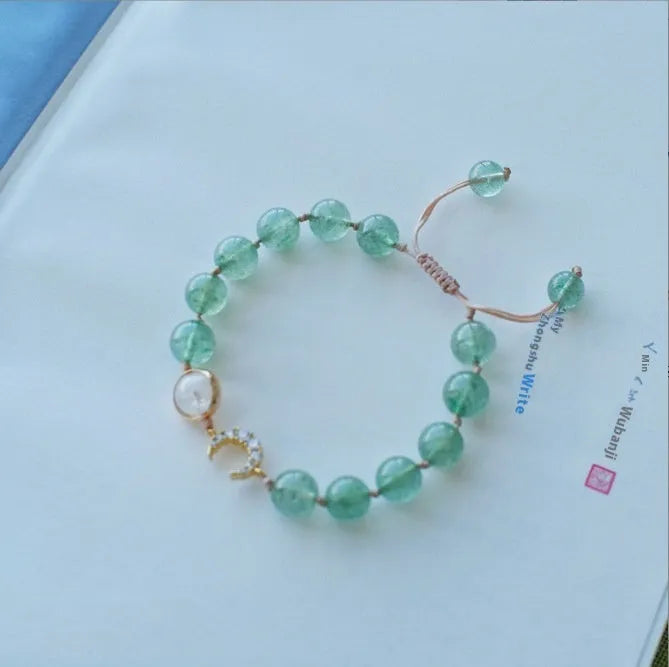 Handmade strawberry quartz crystal bracelet with Hetian jade peach blossom design showing five style variations