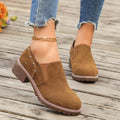 Women's light brown suede ankle boots with a thick low heel and elastic band fastening.