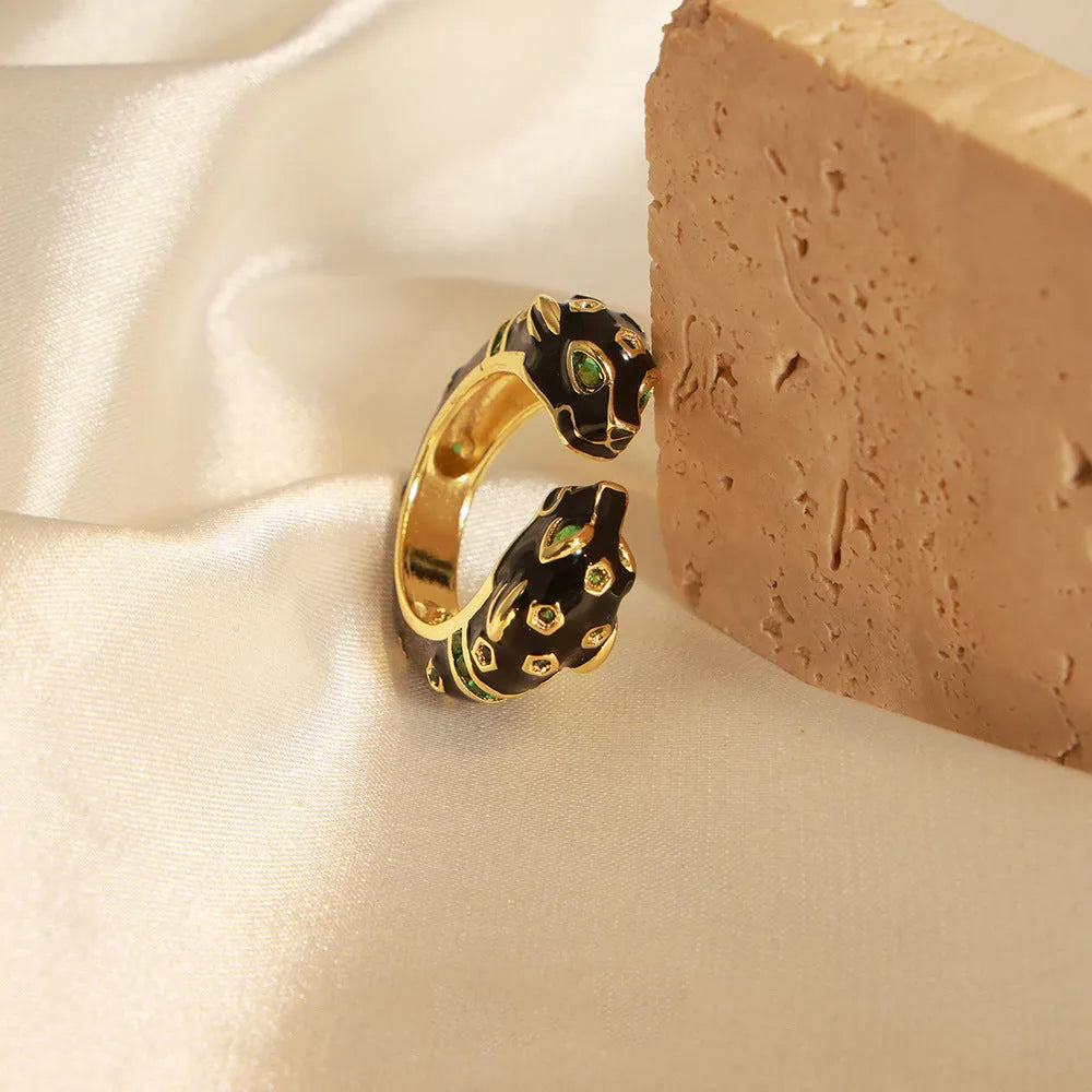 Geometric open copper ring for women with black cheetah print, size 7.